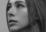 A close-up of an AI-generated portrait with intricate details.