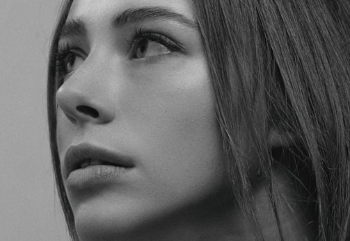 A close-up of an AI-generated portrait with intricate details.
