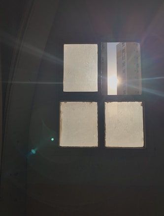 A pristine window reflecting sunlight, symbolizing cleanliness and clarity.
