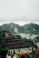a view of a town with mountains in the background