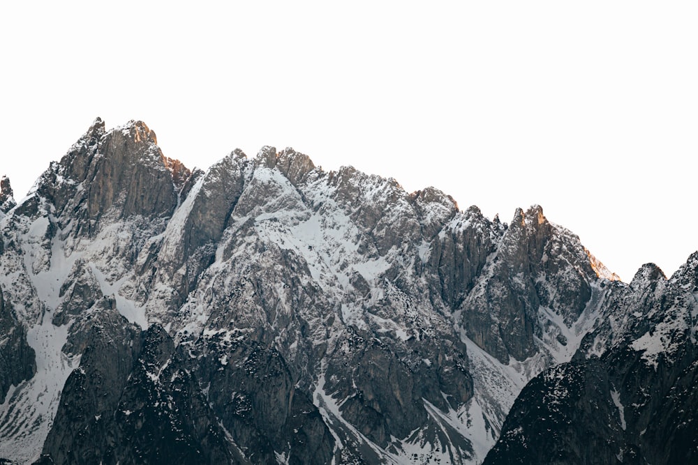 a very tall mountain covered in lots of snow