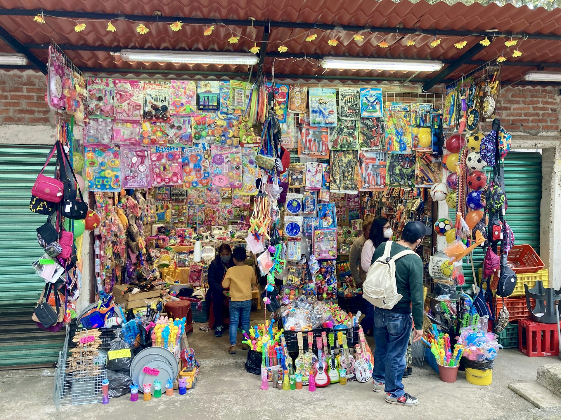 a couple of people standing in front of a store