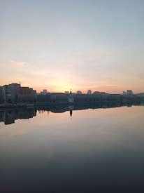 A serene cityscape bathed in soft morning light, evoking calm and quiet moments.