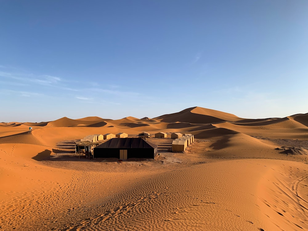 a hut in the middle of the desert