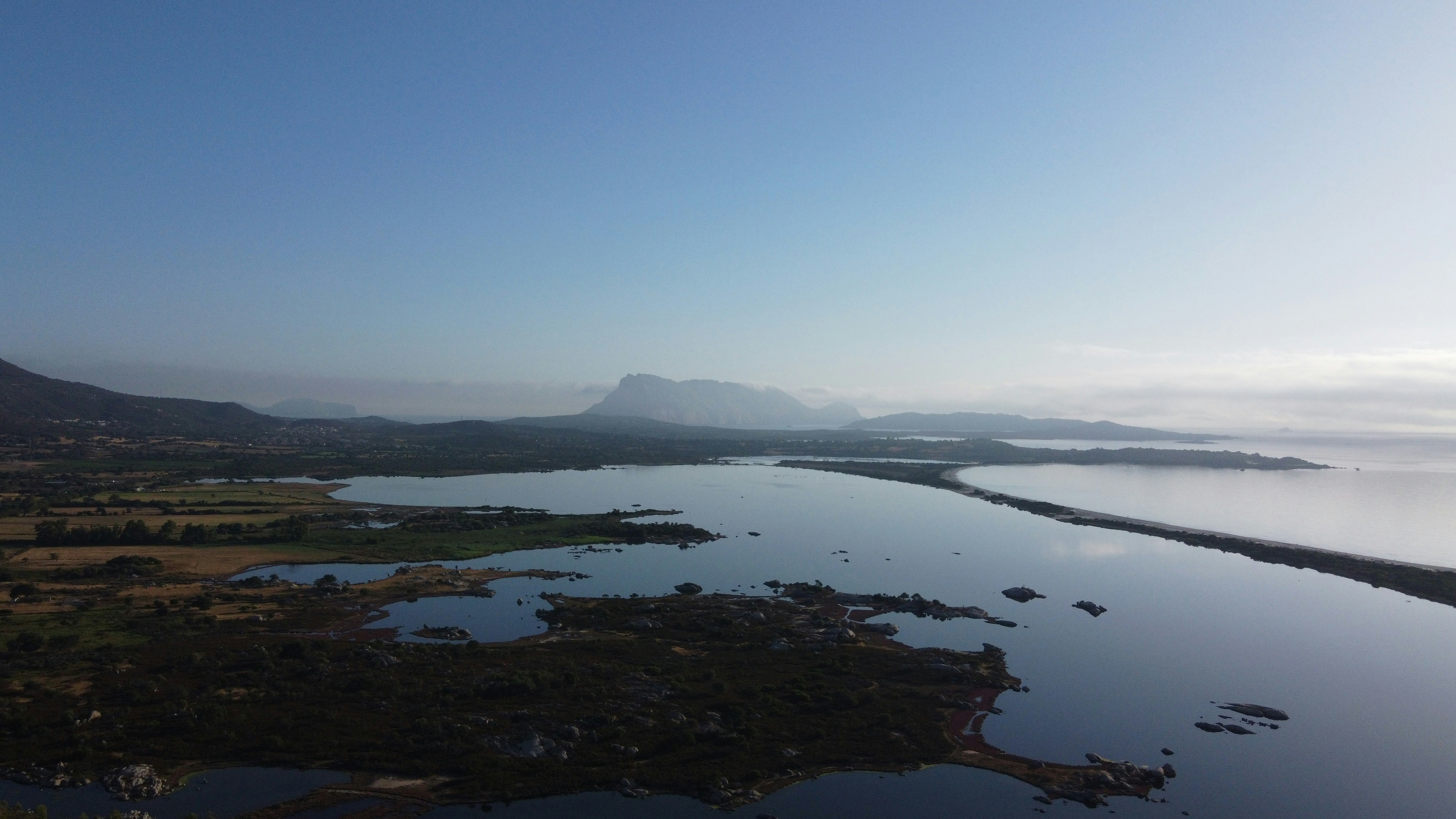 a large body of water surrounded by mountains
