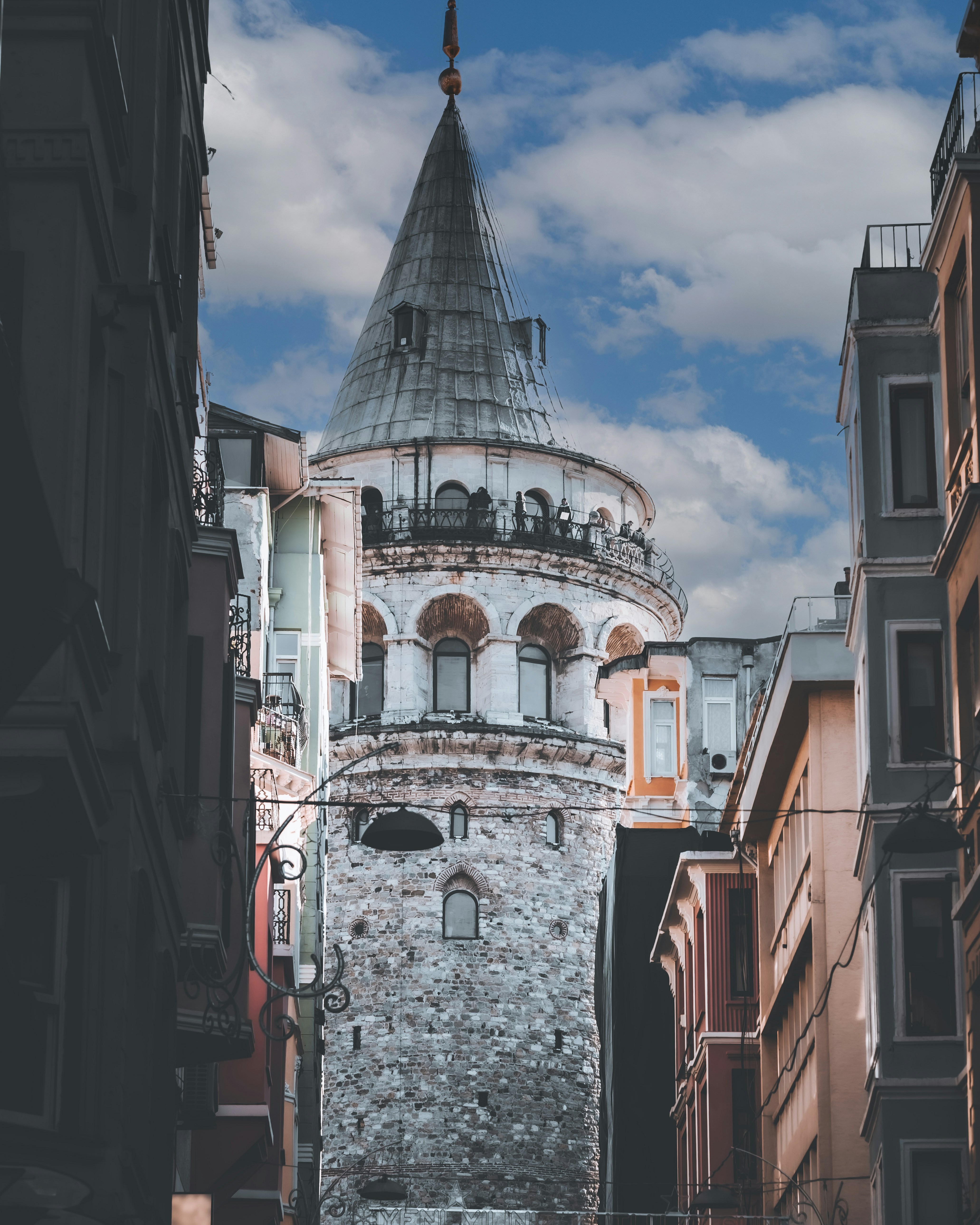 a tall tower with a clock on the top of it
