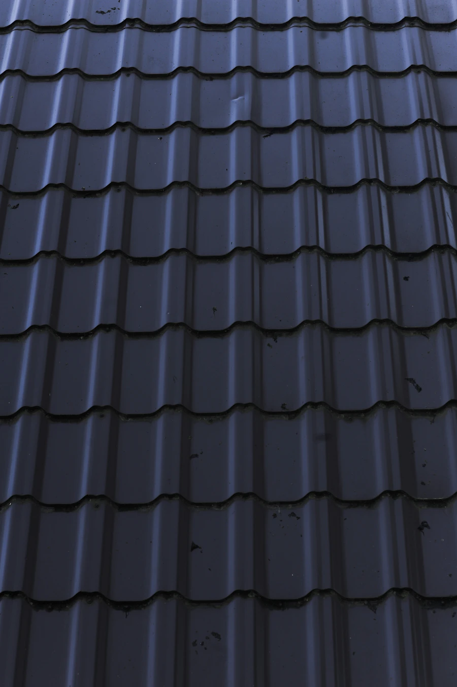 Close-up of a metal roof seam and fastener detail