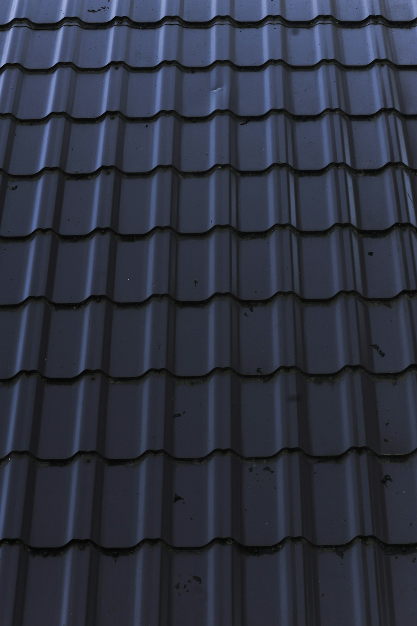 Close-up of a dark Colorbond steel tile roof