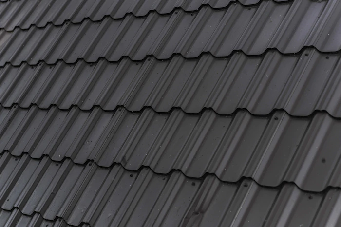 Roof restoration in progress on Auckland concrete tile roof