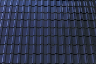 a close up of a roof with a blue tint