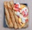 A vibrant crepe station with a variety of toppings and fresh ingredients.
