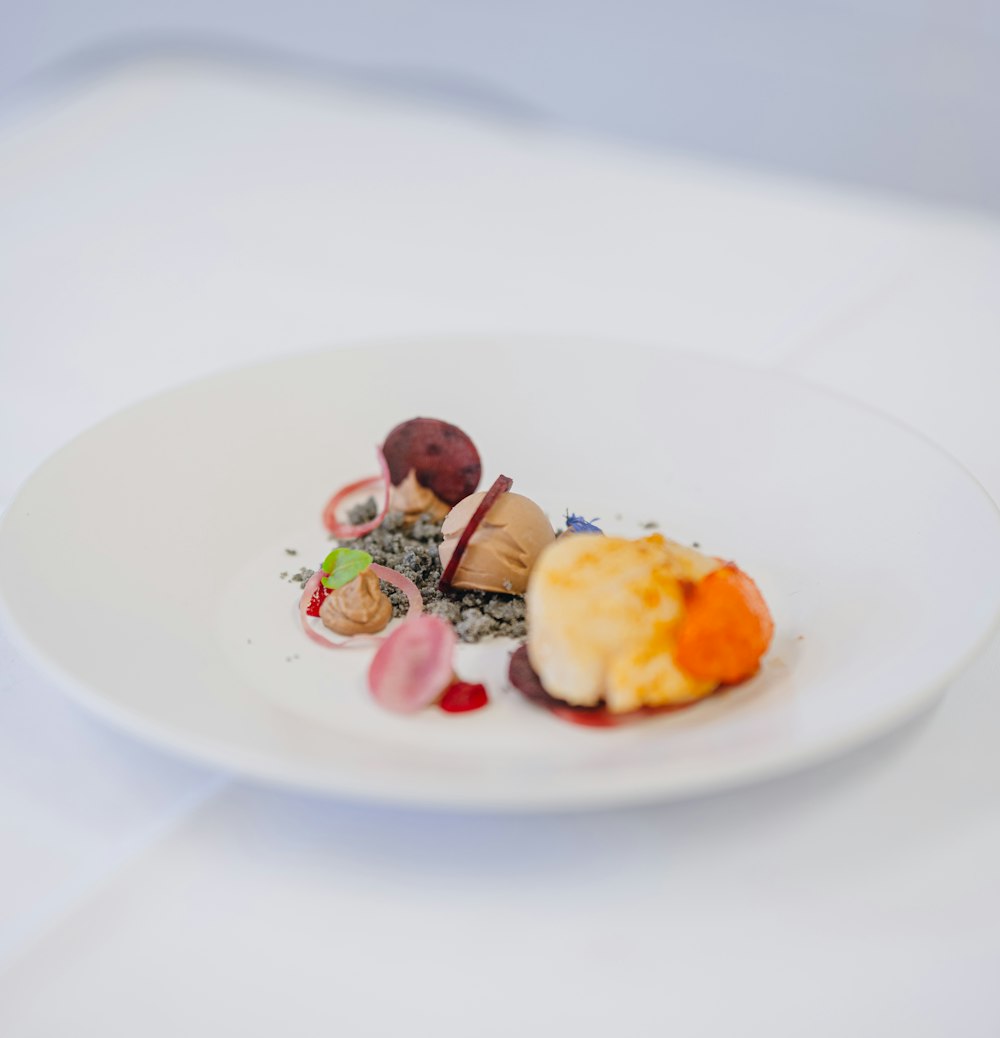 a white plate topped with different types of food