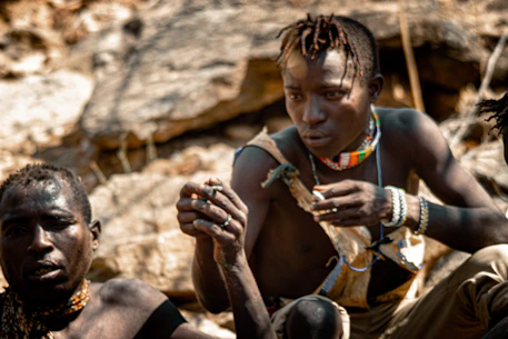 a group of men sitting next to each other