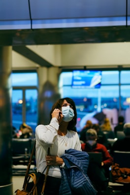 Traveler receiving medical assistance at an airport clinic.