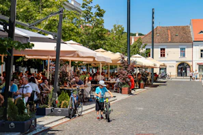 Vibrant street scene from Zadar’s old town with locals enjoying a café