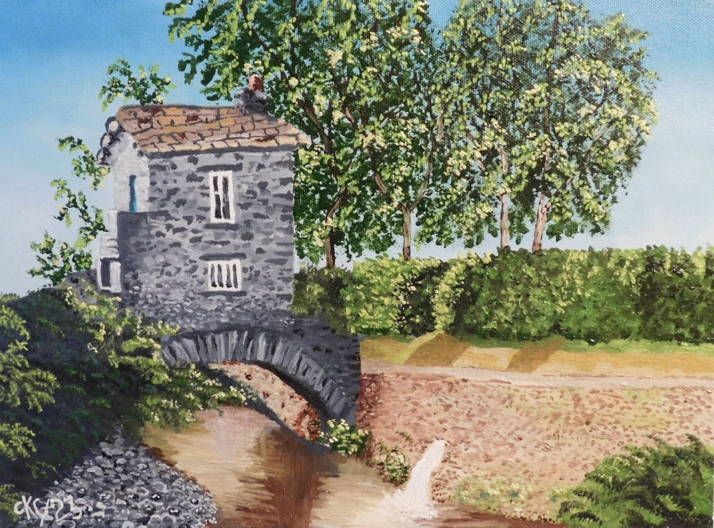 Un dipinto di un ponte di pietra su un fiume