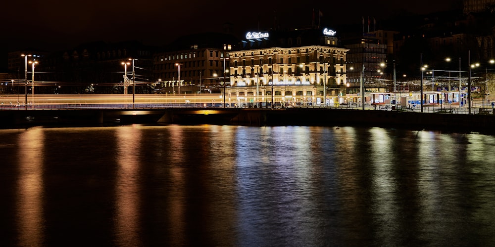 a bridge over a body of water at night