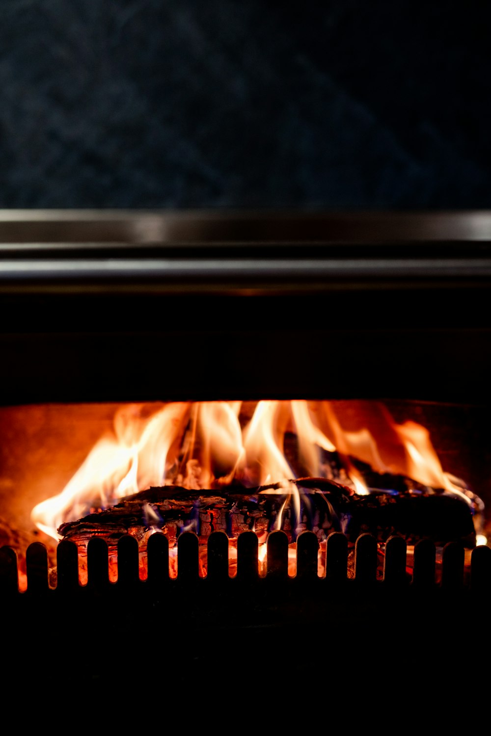 a close up of a fire burning in a stove