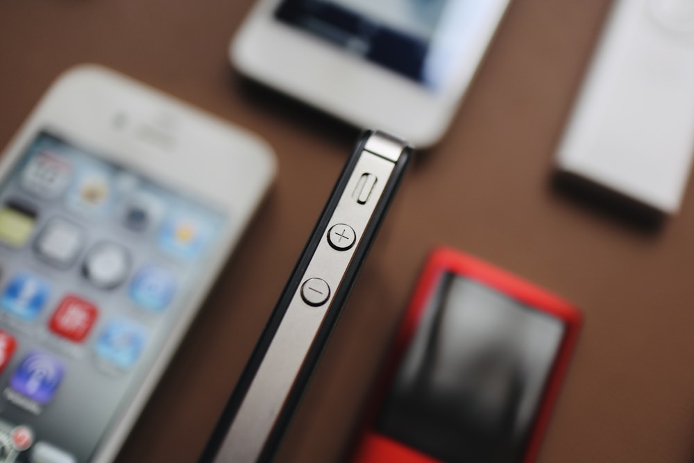 a close up of a cell phone on a table