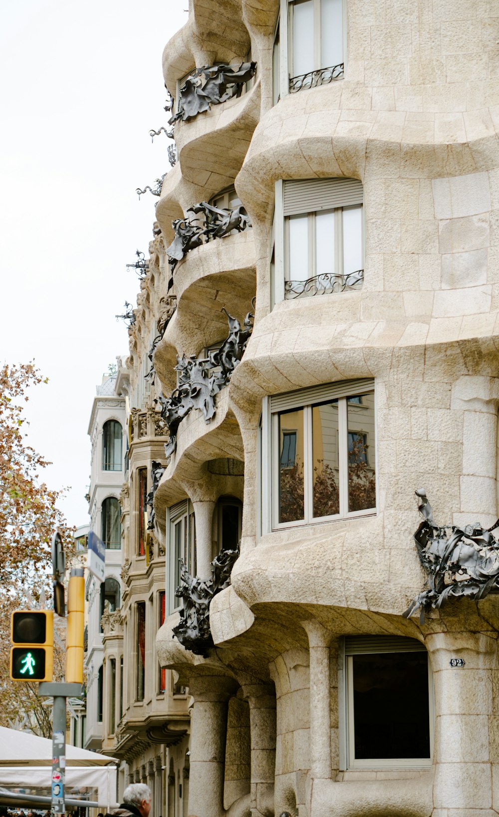 a very tall building with many windows on the side of it