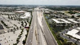 an aerial view of a highway and a city