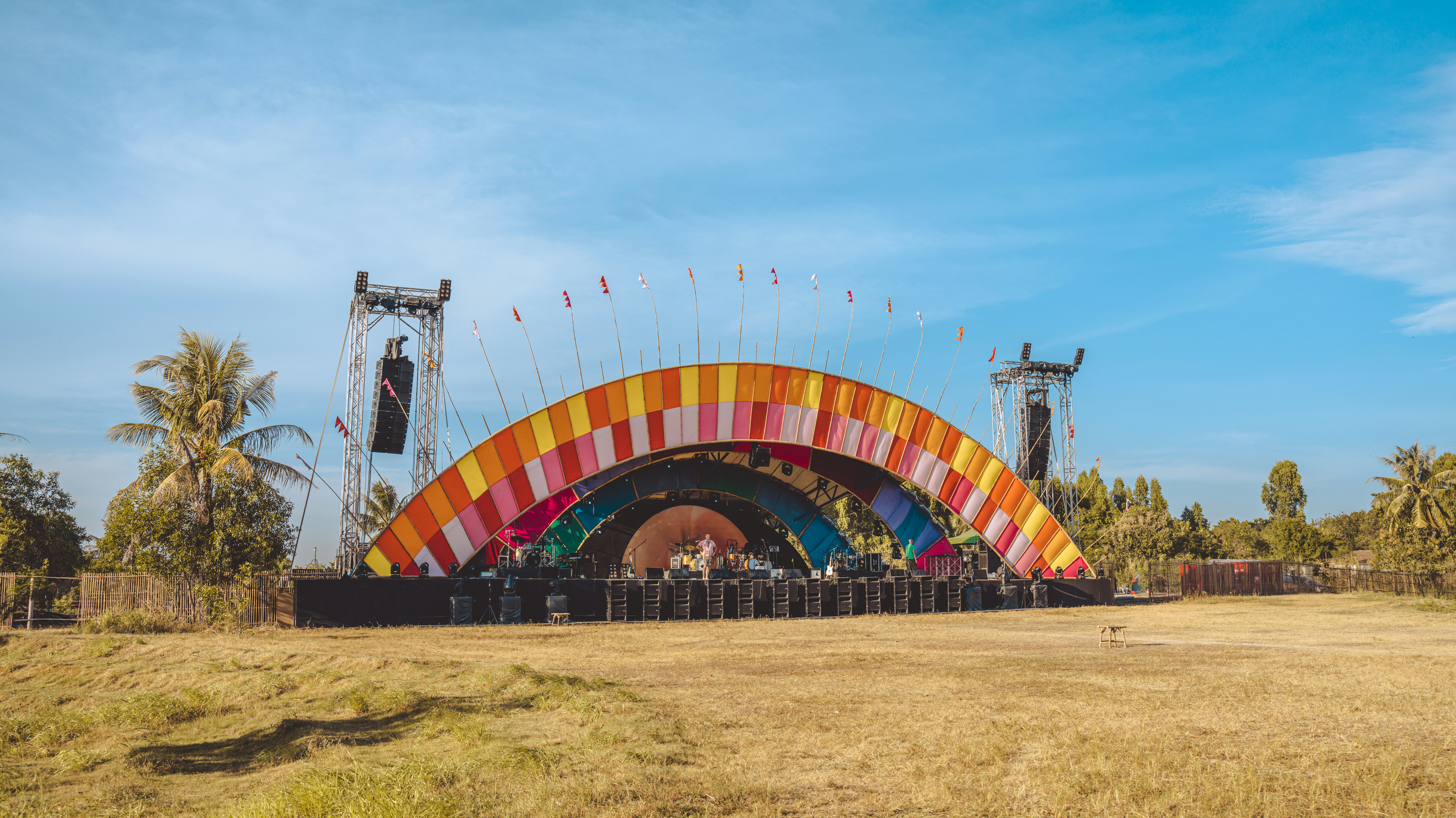 a stage set up for a concert in a field