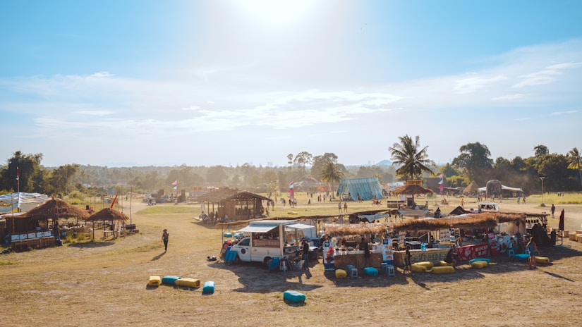 a group of vehicles parked in a field