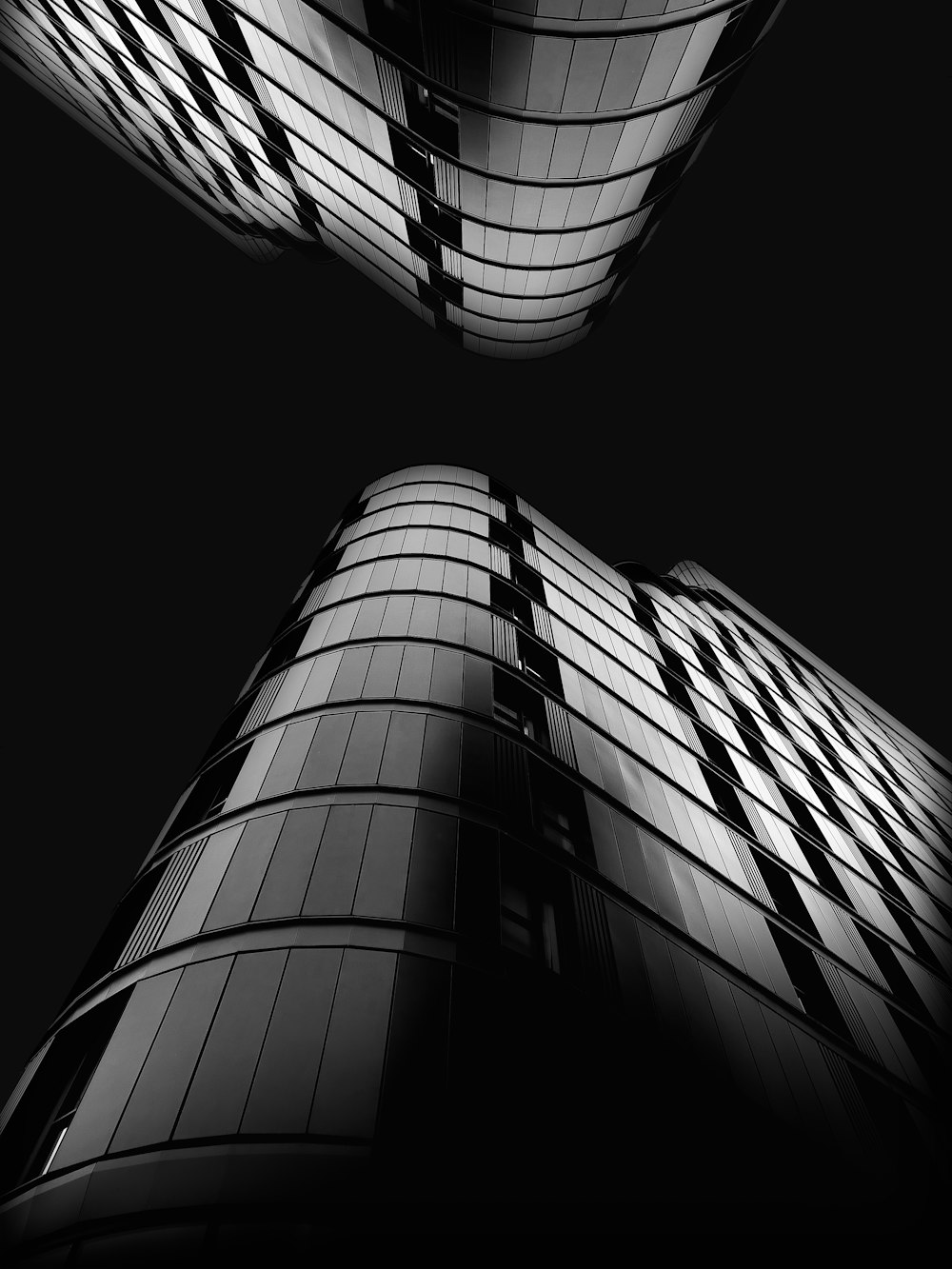 a black and white photo of a tall building