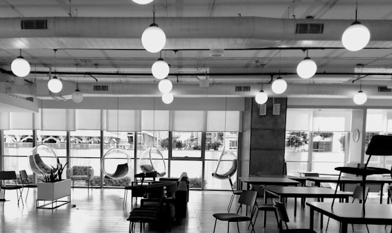 a black and white photo of a large room