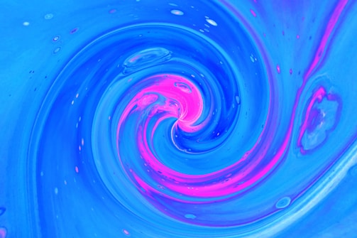 A dynamic 3D vortex swirling with vibrant colors representing cultural trends.