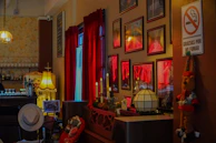 Cozy karaoke and wine bar area with warm lighting and comfortable seating.