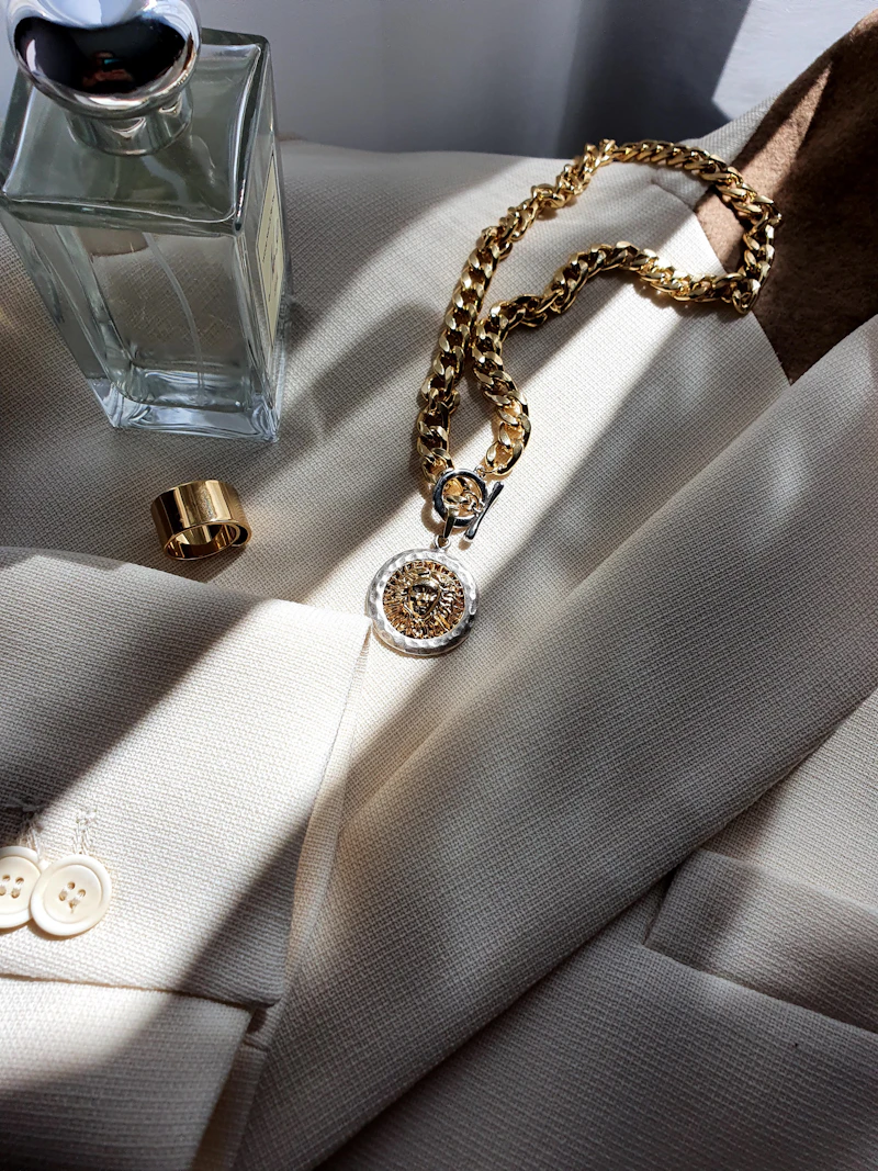 Refined fragrance presentation on a light surface