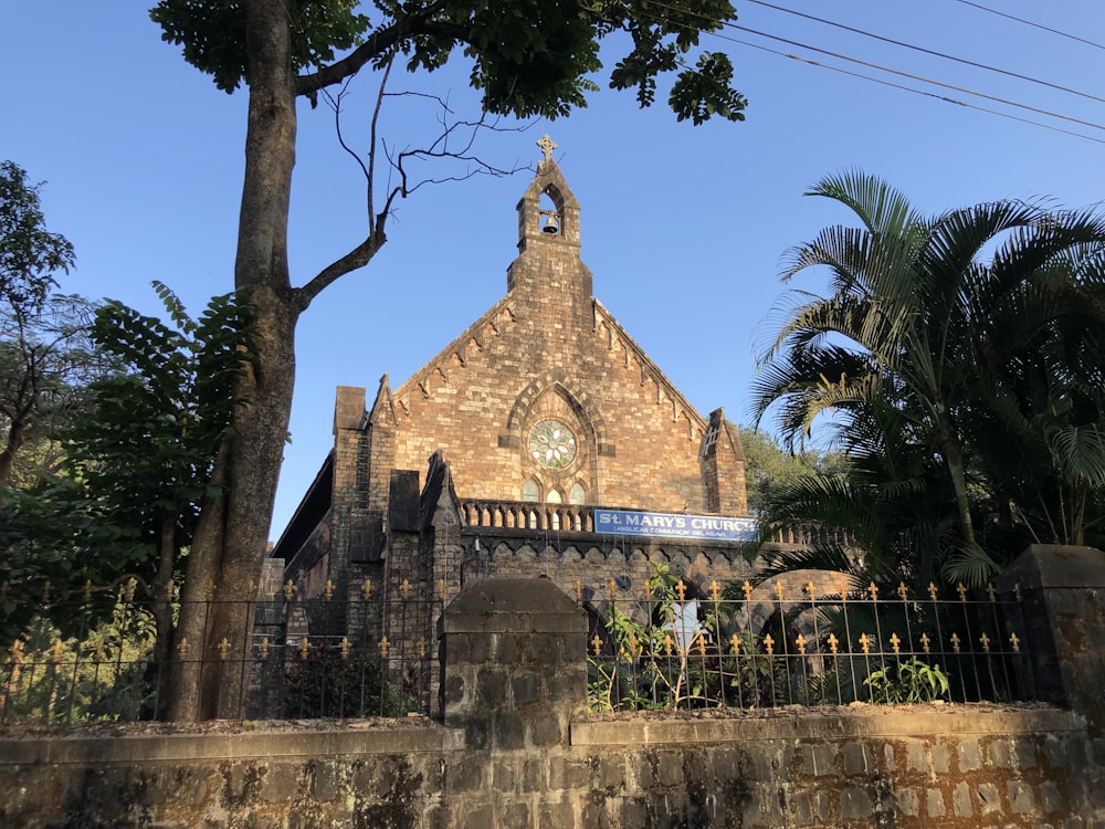 a church with a clock on the front of it