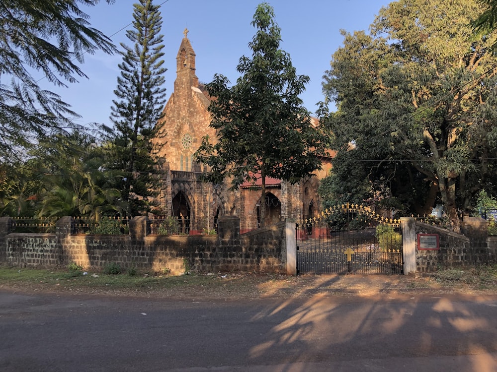 an old church in the middle of a street