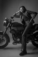 A magazine cover featuring a female biker in leather attire.