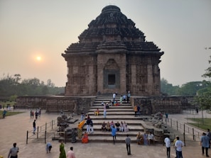 A peaceful moment captured at the serene Vikramshila ruins with visitors admiring the architecture