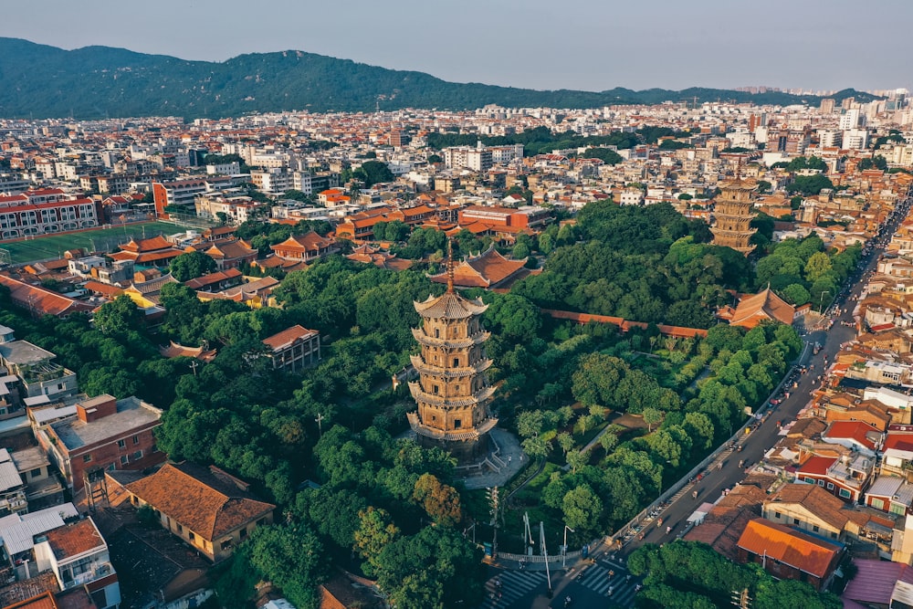 an aerial view of a city with tall buildings