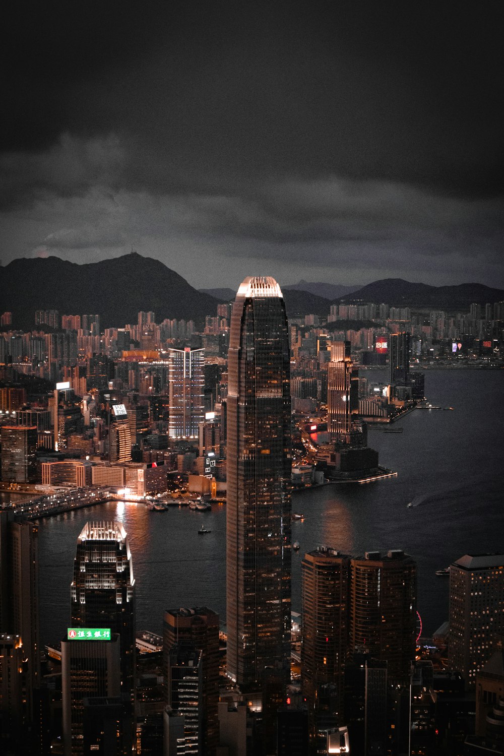 a view of a city at night from the top of a building