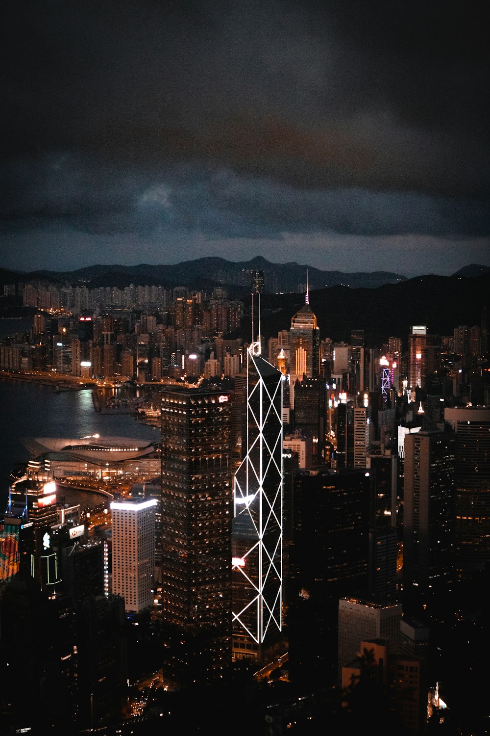 a view of a city at night from the top of a building