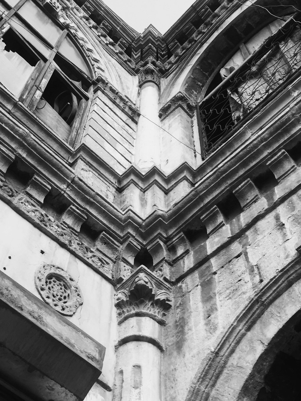 a black and white photo of an old building