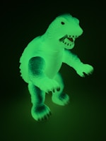 A glowing neon pink and electric blue 3D printed creature figurine on a dark background.