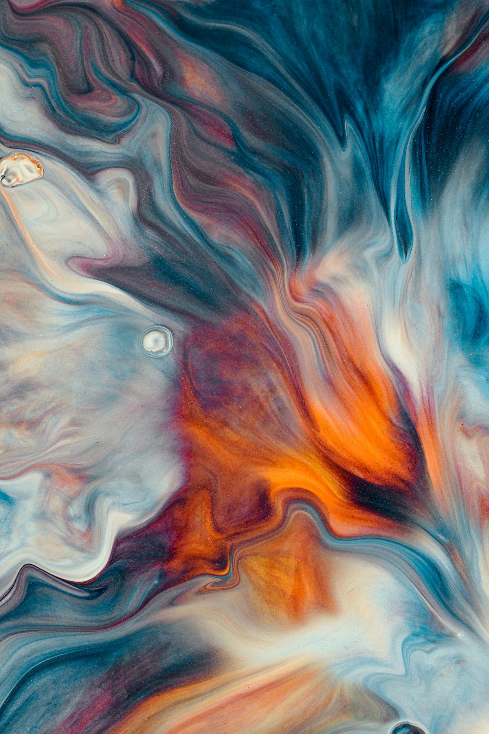 an abstract painting with blue, orange, and white colors
