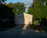 Photo of a clean, organized garage after junk removal with sunlight streaming in.