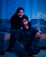 Supportive therapy session between a couple in a cozy room