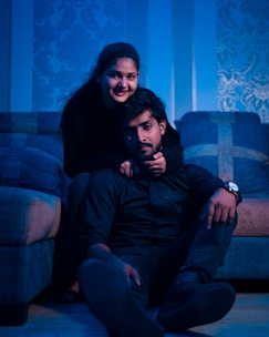 A couple sitting together in a cozy counseling session.