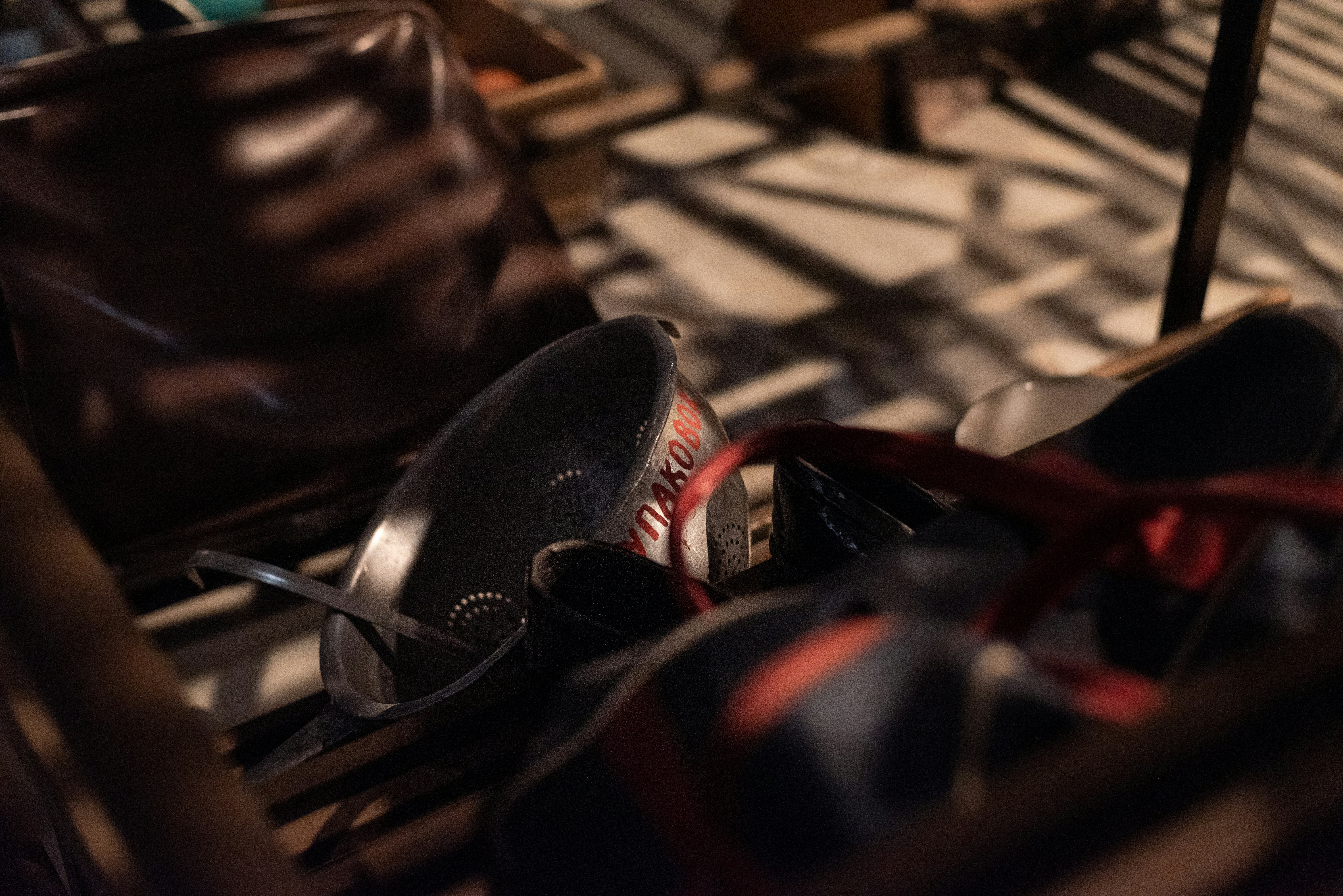 a pair of shoes sitting on top of a chair
