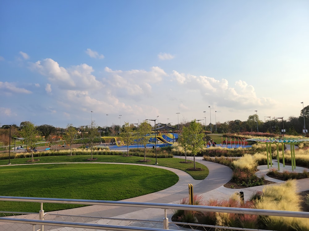a view of a park from a walkway
