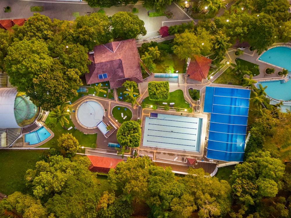 a bird's - eye view of an aerial view of a swimming pool and