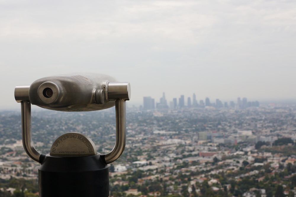 a close up of a camera on top of a building