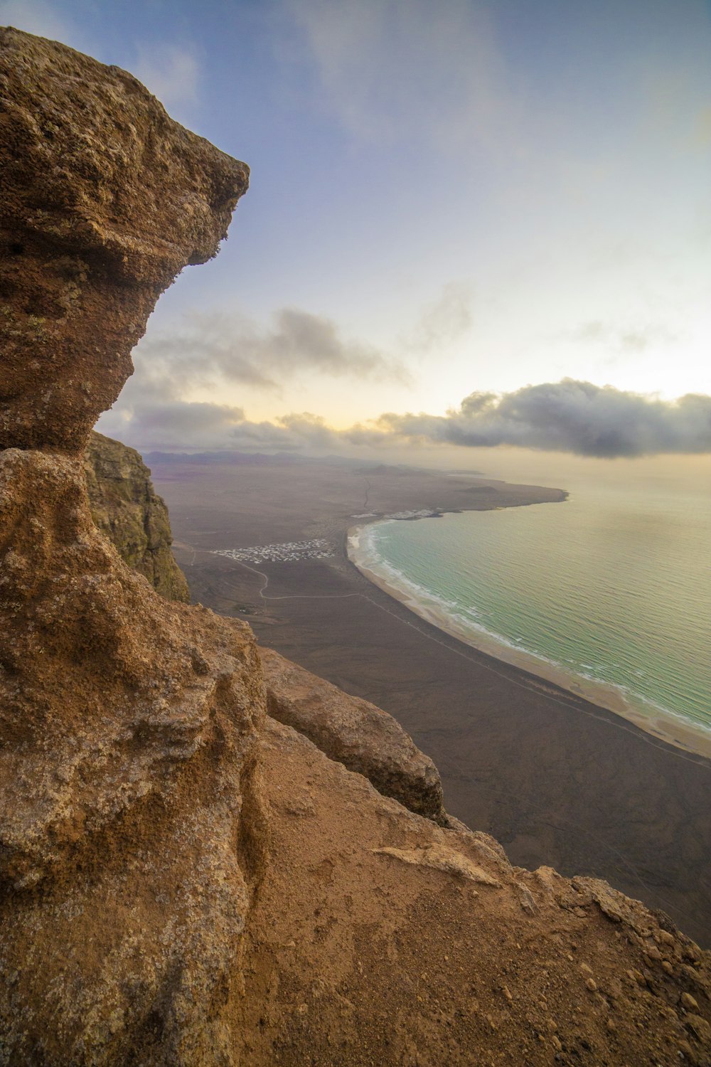 a view of the ocean from a cliff